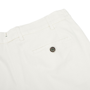 A Cream White Cotton Stretch Chinos by Berwich with a button on the side made from cotton-lyocell.
