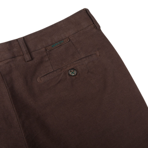 A Dark Brown Cotton Moleskin Chinos with a button on the side, made of cotton by Berwich.