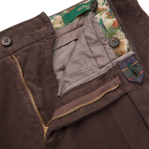 A pair of Dark Brown Cotton Moleskin Chinos by Berwich with a pocket on the side.