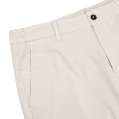 The Berwich Light Beige Cotton Stretch Chinos in slim fit.