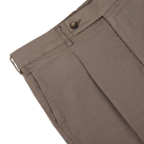 Berwich Light Brown Cotton Blend Pleated Shorts with a buttoned waistband and creases on a white background.