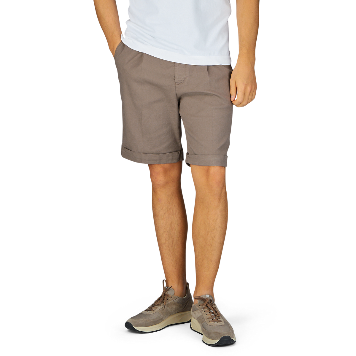 A person standing in Berwich Light Brown Cotton Blend Pleated Shorts and light brown shoes against a white background.