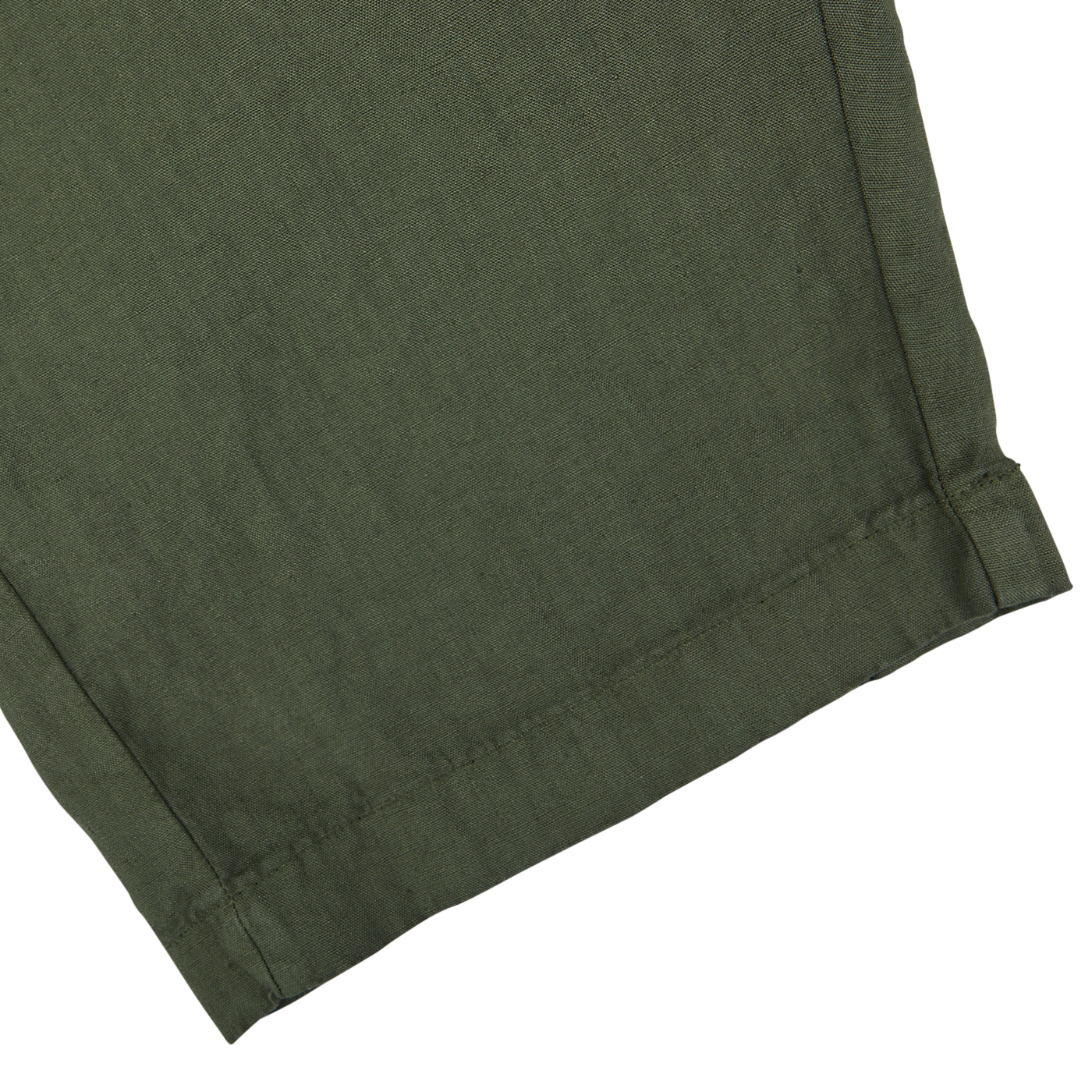 Pure linen fabric in militare green with a hem on a white background.
Product Name: Berwich Militare Green Washed Linen Drawstring Shorts
