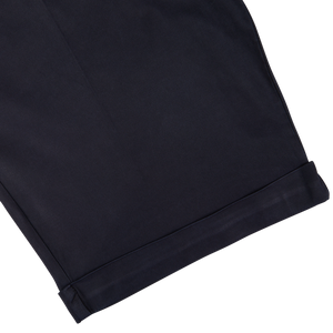Navy Blue Cotton Blend Pleated Bermuda shorts by Berwich with a visible hem on a white background.