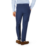 Man wearing Navy Blue Melange Linen Flat Front Trousers from Berwich and brown shoes.