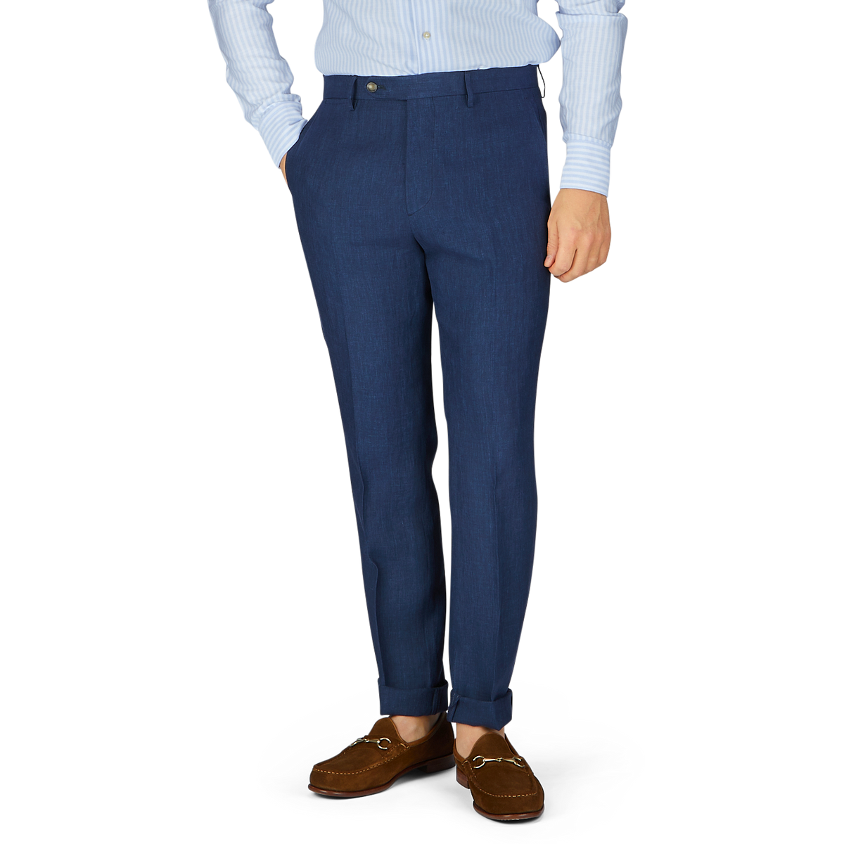Person wearing Berwich navy blue melange linen flat front trousers and brown loafers with no visible upper body.