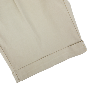 Sabbia Beige Cotton Blend Pleated Shorts by Berwich with a folded hem on a white background.