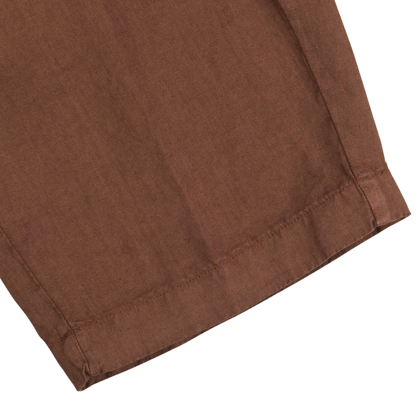 A close-up of Berwich's Terra Brown Washed Linen Drawstring Shorts, highlighting the texture and hem detail of the material against a white background.
