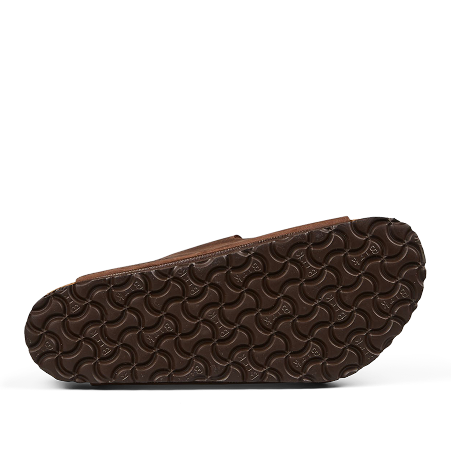 A brown patterned leather cosmetic bag with a zipper closure from Birkenstock.
