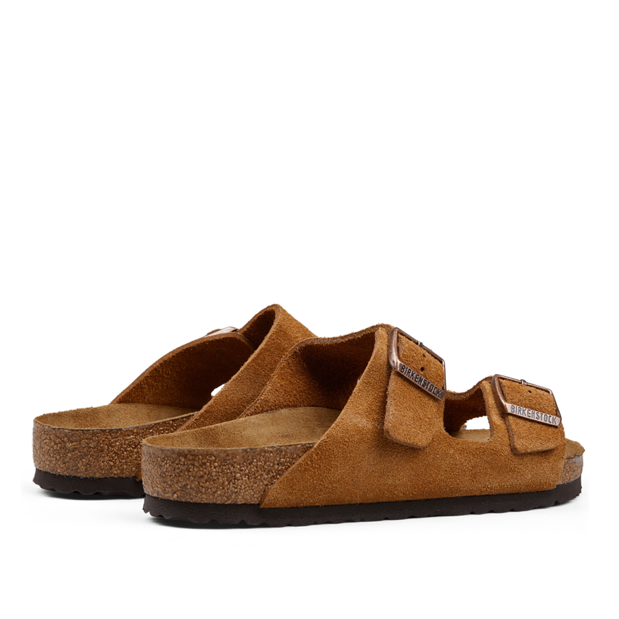 A pair of Mink Brown Suede Leather Birkenstock Arizona sandals with adjustable straps and cork footbeds.