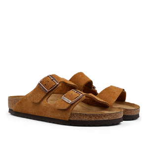 A pair of Mink Brown Suede Leather Birkenstock Arizona Sandals with two adjustable straps and cork soles.