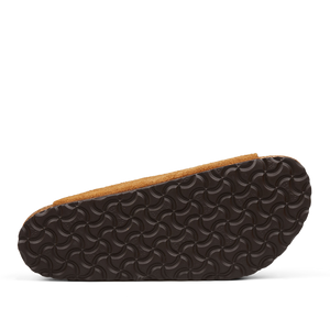 A footbed of a Birkenstock Arizona sandal with a wavy tread pattern.