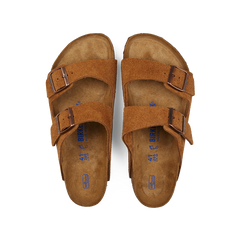 A pair of Mink Brown Suede Leather Arizona Birkenstock sandals with adjustable straps displayed on a white background.