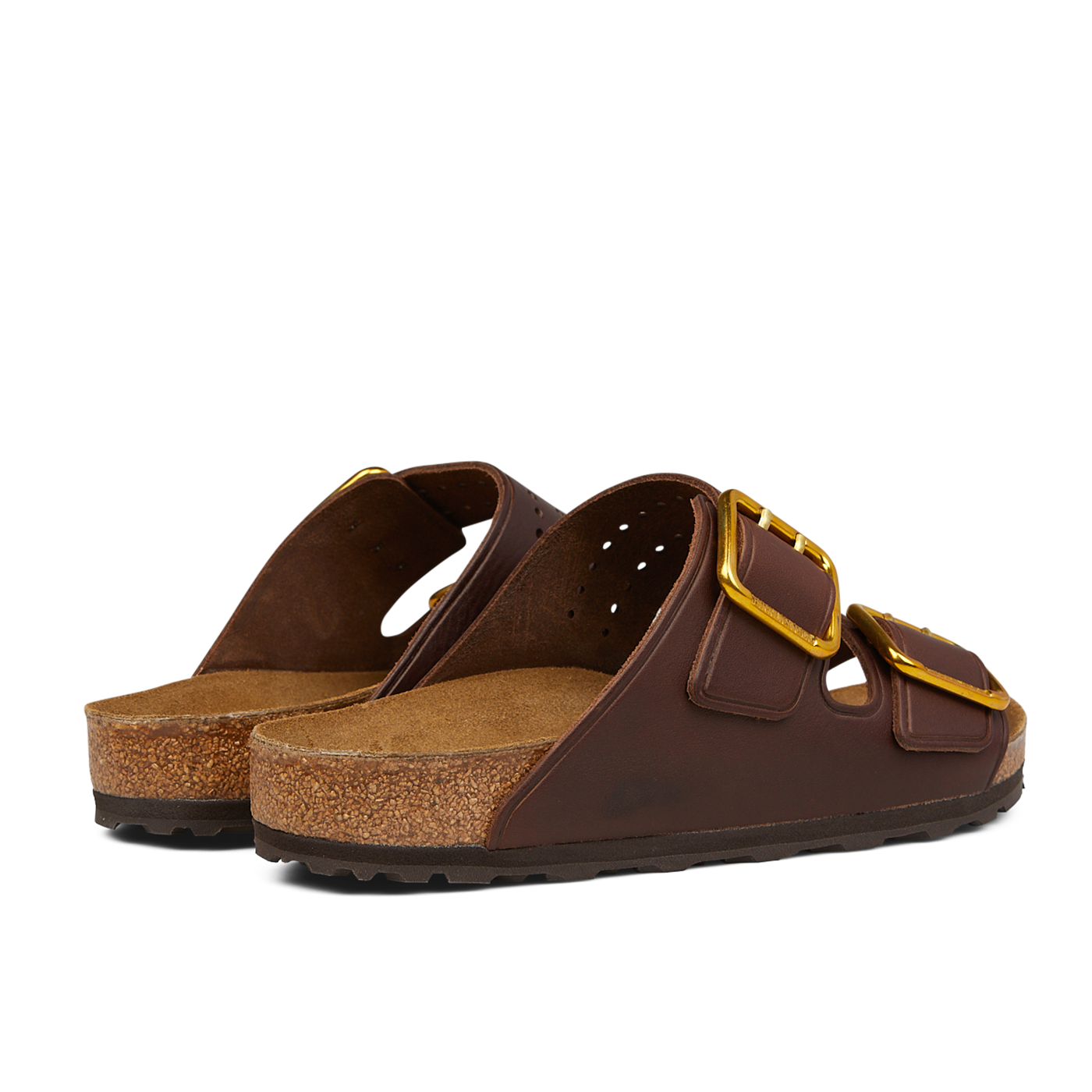 A pair of brown, open-toe sandals with cork soles and two wide straps featuring large gold buckles. The Birkenstock Roast Bold Natural Leather Arizona Sandals, crafted with a natural leather upper, are viewed from the back and side and include an anatomically-supported footbed for added comfort.