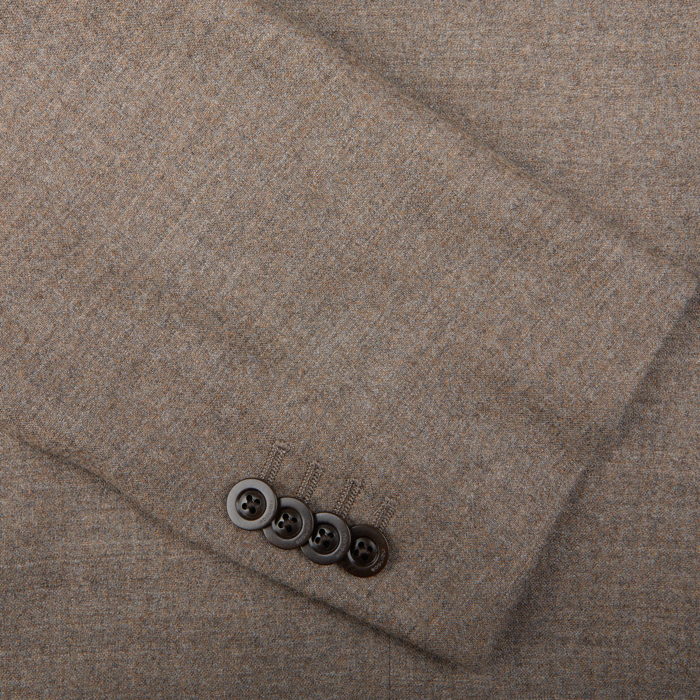 A close up of an elegant Boglioli Beige Grey Wool Flannel K Suit.