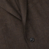 A close up image of a brown checked lambswool Boglioli K Jacket suit, exuding Italian craftsmanship.