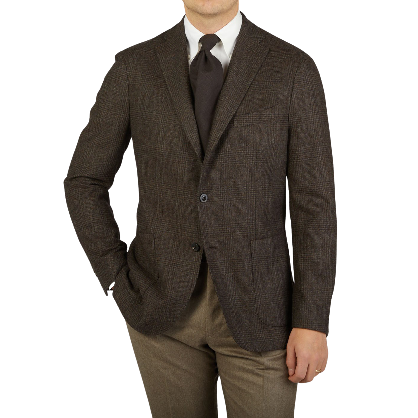 A man is posing in a Boglioli Brown Checked Lambswool K Jacket, showcasing the unstructured craftsmanship of his brown suit and tan pants, proudly made in Italy.