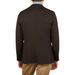 The back view of a man wearing an unstructured Boglioli Brown Herringbone Wool K Jacket.