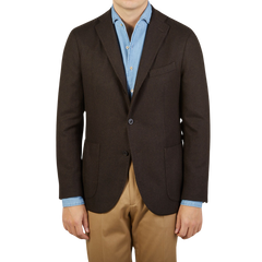 A man wearing a Boglioli Brown Herringbone Wool K Jacket.