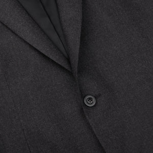 A close up of a Boglioli Charcoal Grey Wool Flannel K Suit with black buttons.
