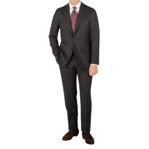 A man is posing for a picture in a Boglioli Charcoal Grey Wool Flannel K Suit.