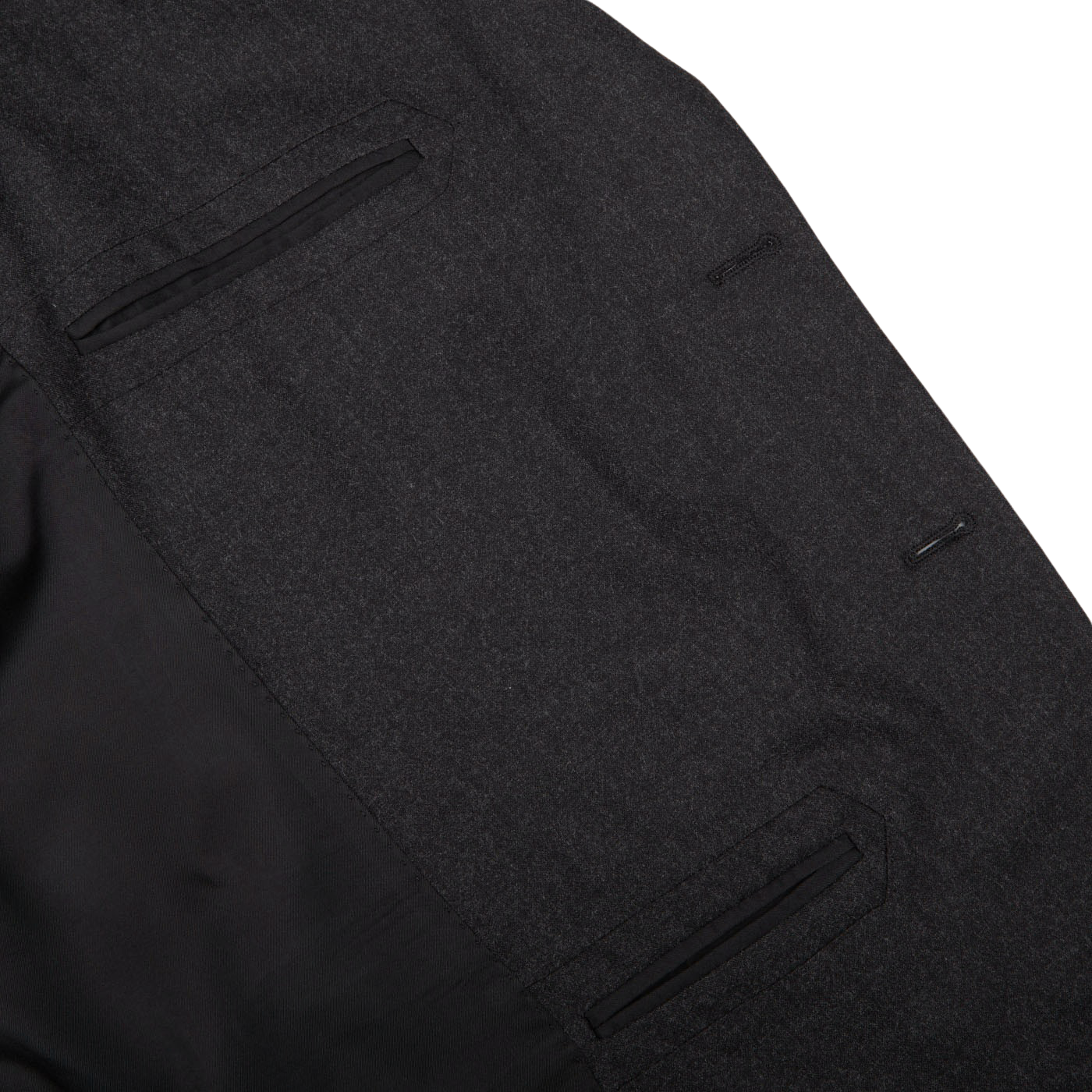 A close up of an understated Boglioli Charcoal Grey Wool Flannel K Suit.