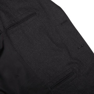 A close up of an understated Boglioli Charcoal Grey Wool Flannel K Suit.
