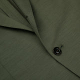 A close up of a Boglioli Dark Green Wool Jersey K Jacket with regular fit and buttons.