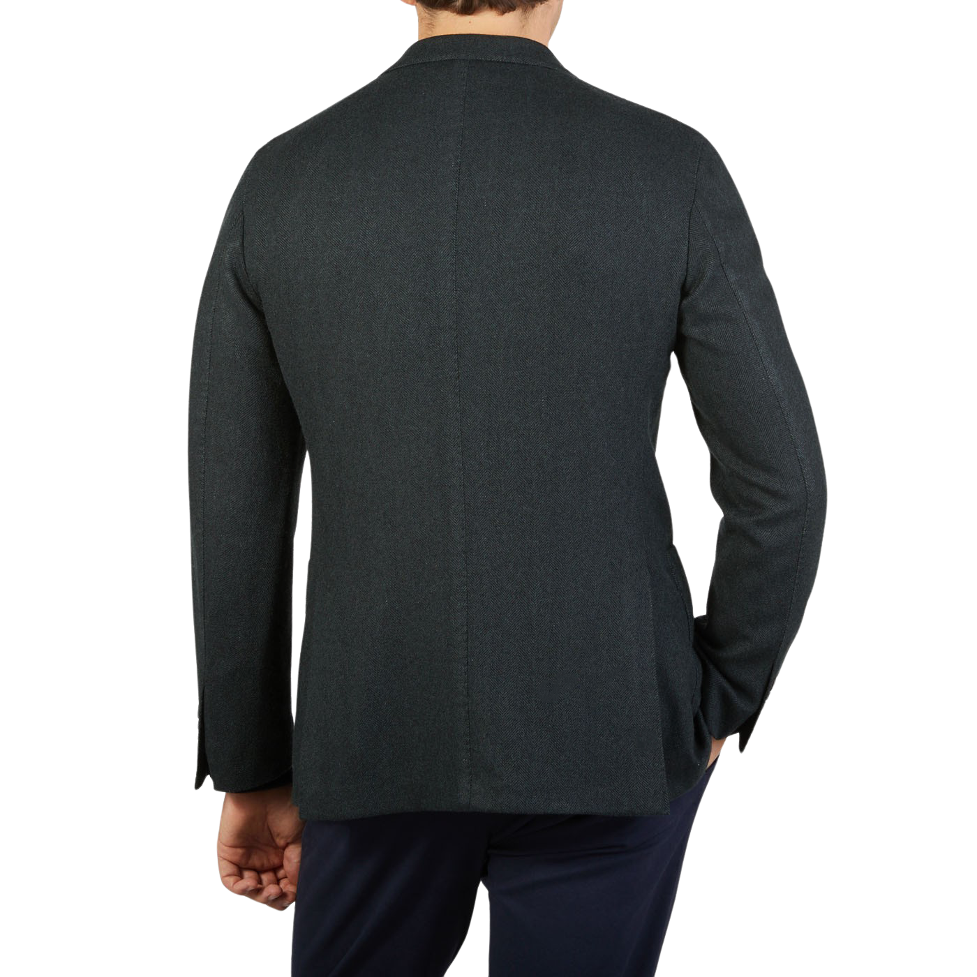 The back view of a man wearing a Boglioli Green Herringbone Wool K Jacket with unstructured craftsmanship.