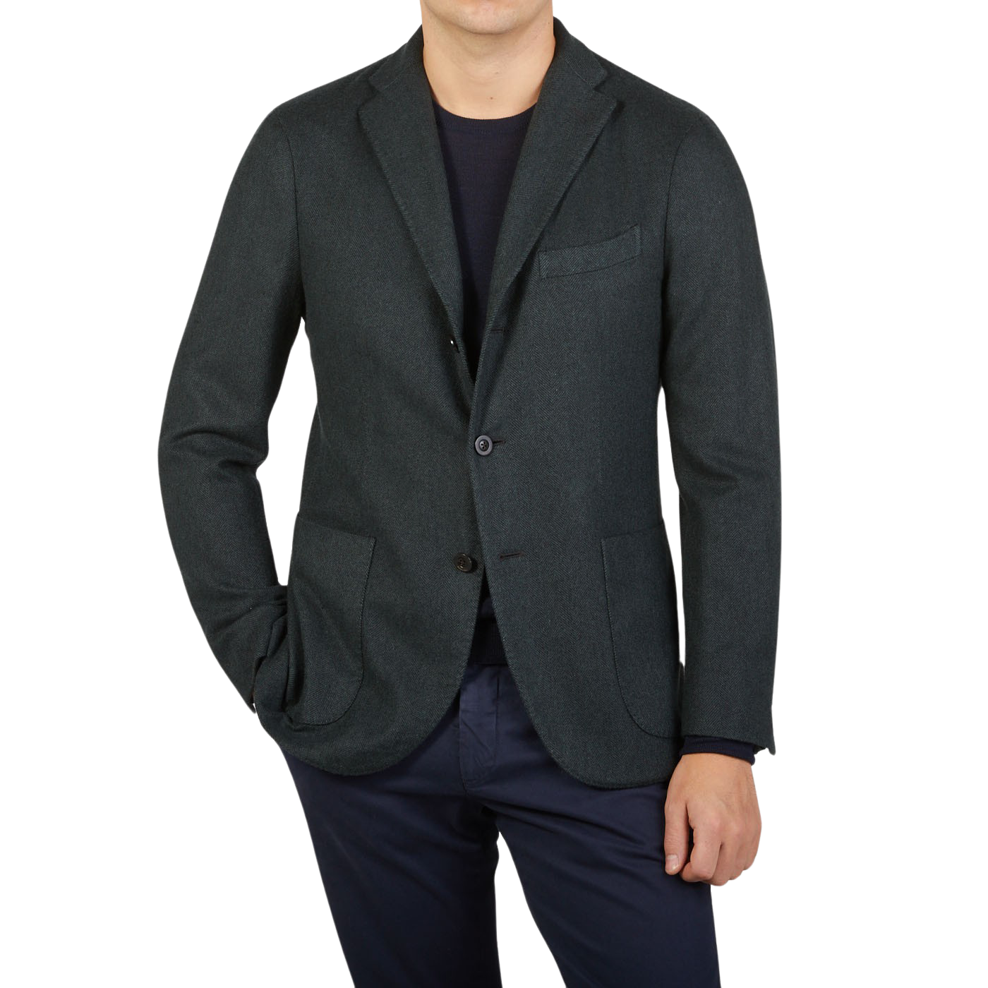 An unstructured Boglioli Green Herringbone Wool K Jacket made in Italy, worn by a man sporting a green blazer and black pants.