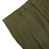 Boglioli Green Washed Irish Linen Trousers with visible waistband and stitching detail on a white background.