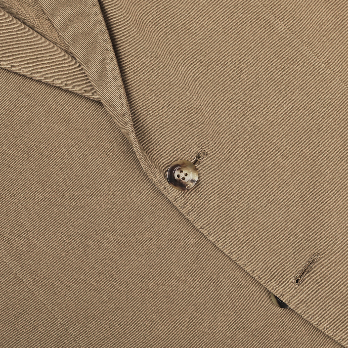 Close-up of the Khaki Beige Heavy Cotton Twill Suit by Boglioli, featuring button detail and crafted from durable cotton twill.