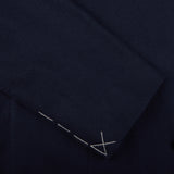 A close up of a navy blue Boglioli K.Jacket suit with silver stitching and unstructured craftsmanship.