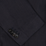 Dark navy Boglioli Navy Blue Washed Irish Linen K Jacket sleeve with four buttons.