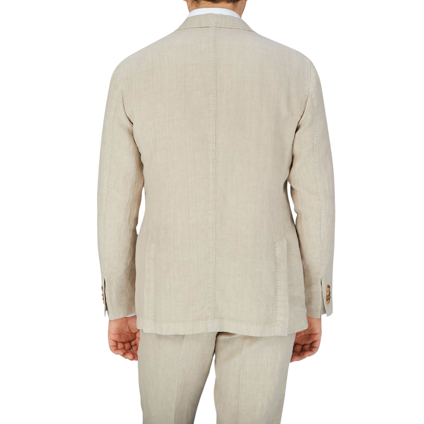 The back view of a man wearing a Boglioli Sand Beige Washed Linen Unstructured Suit.