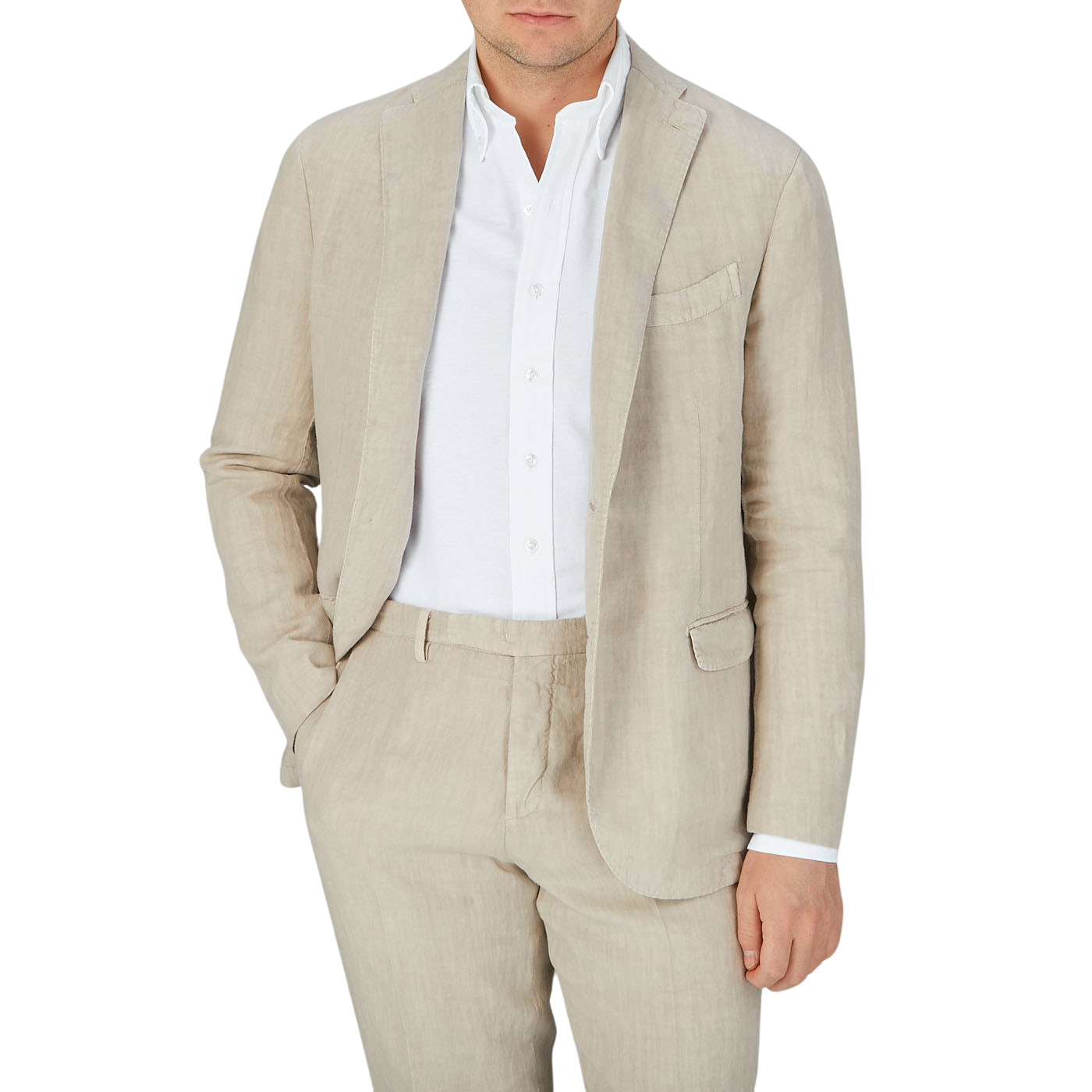 A gentleman dressed in a Boglioli Sand Beige Washed Linen Unstructured Suit and white shirt.