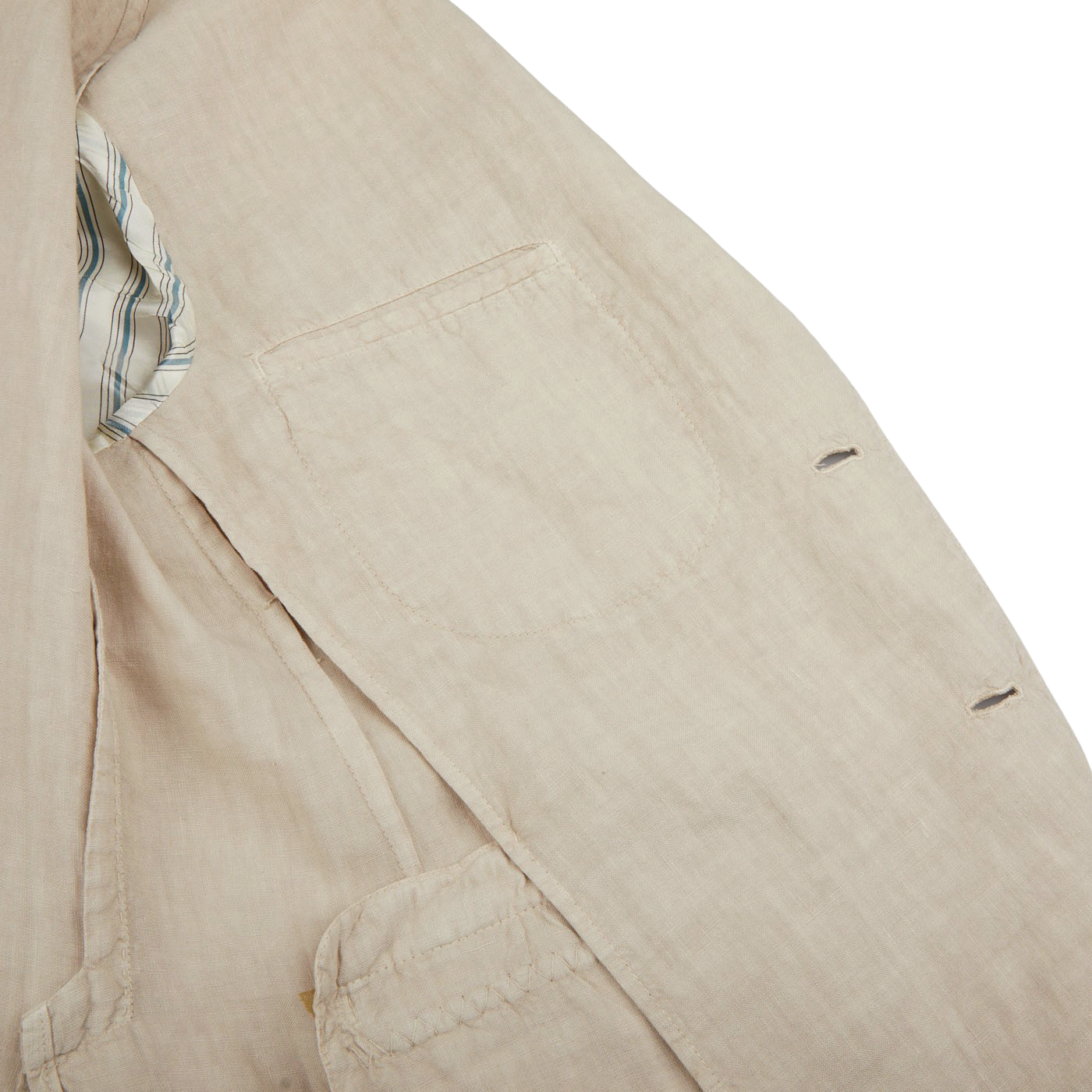 A close up of a Boglioli Sand Beige Washed Linen Unstructured Suit.