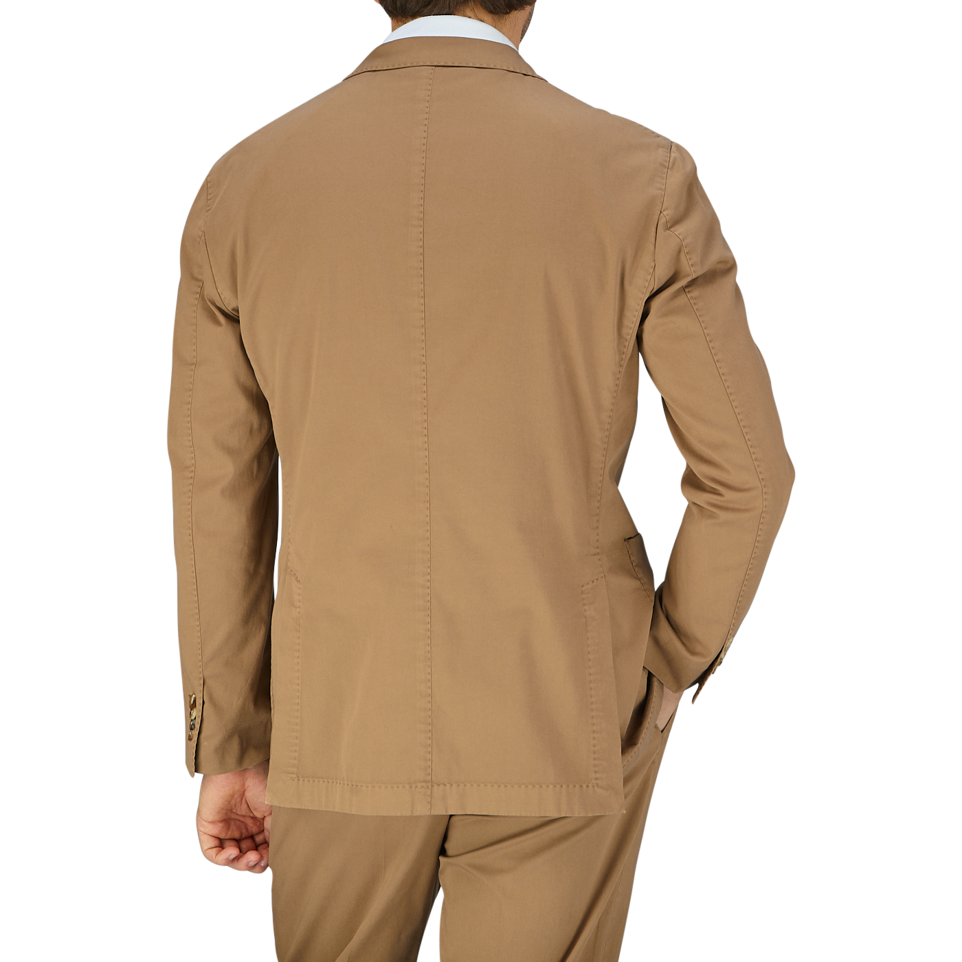 Man standing with his back to the camera wearing a beige, unstructured Boglioli Tobacco Brown Washed Cotton K jacket, crafted in Italy.