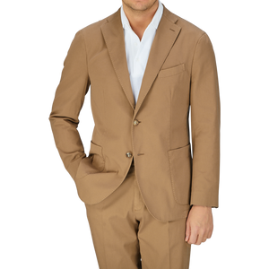 Man wearing an unstructured Boglioli tobacco brown washed cotton K Jacket with a white shirt, crafted in Italy.