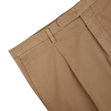 Boglioli's Tobacco Brown Washed Cotton Pleated Trousers with pleated front detail on a white background.