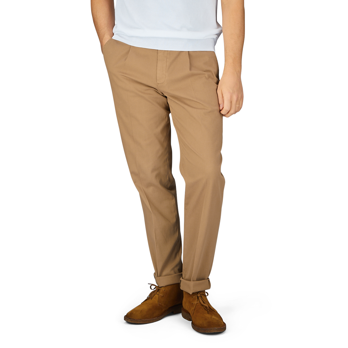 Man wearing Boglioli tobacco brown washed cotton pleated trousers and brown suede shoes.
