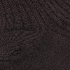 Close-up of dark brown ribbed fabric with a diagonal seam pattern, reminiscent of Bresciani's fine wool nylon socks, crafted in Italy.