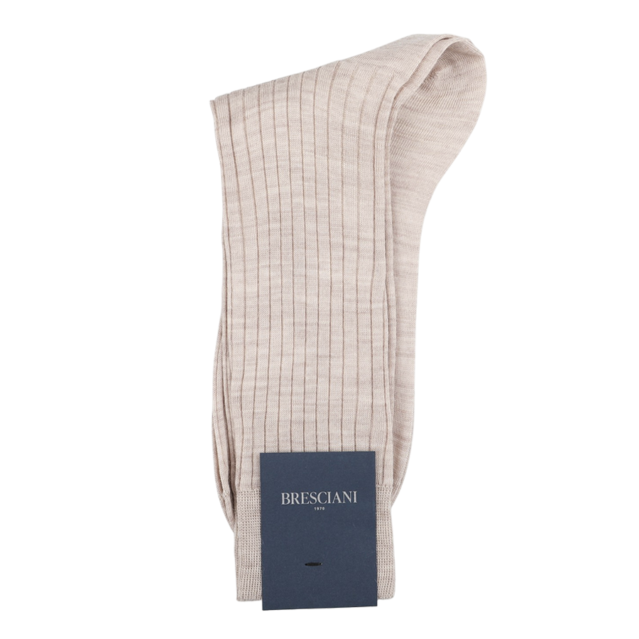 A pair of light beige ribbed socks crafted from a luxurious wool-nylon blend, featuring the Bresciani navy label and made in Italy.