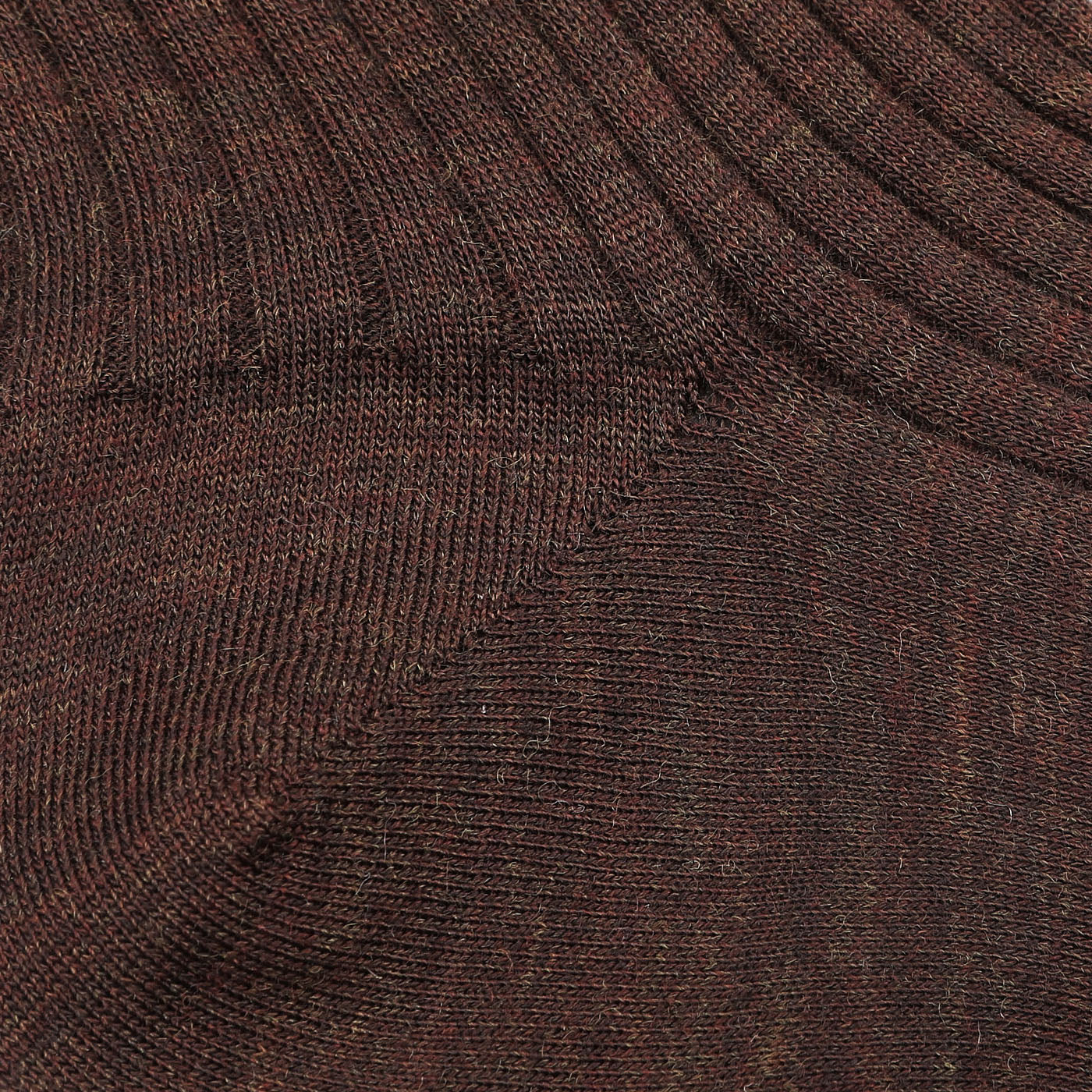 Close-up of the Rust Brown Ribbed Wool Nylon Socks by Bresciani, made in Italy, showing detailed texture and ribbed patterns.