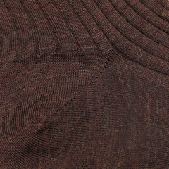 Close-up of the Rust Brown Ribbed Wool Nylon Socks by Bresciani, made in Italy, showing detailed texture and ribbed patterns.