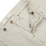 The back pocket of Light Beige Cotton Stretch BG07 Pleated Chinos, made from cotton with a touch of stretch by Italian trouser specialist Briglia.