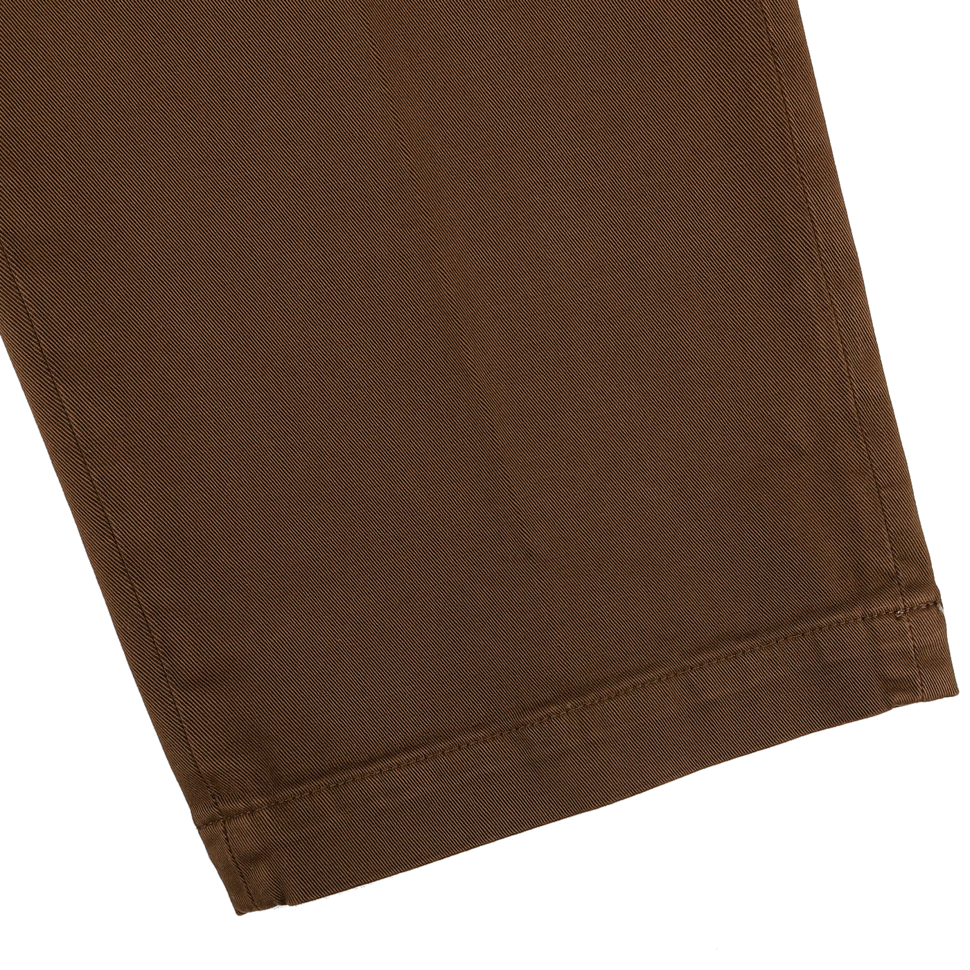 Close-up of the hem on a pair of Brown Cotton Stretch Soho Trousers by Briglia, highlighting the detailed stitching and texture of cotton twill against a plain background.