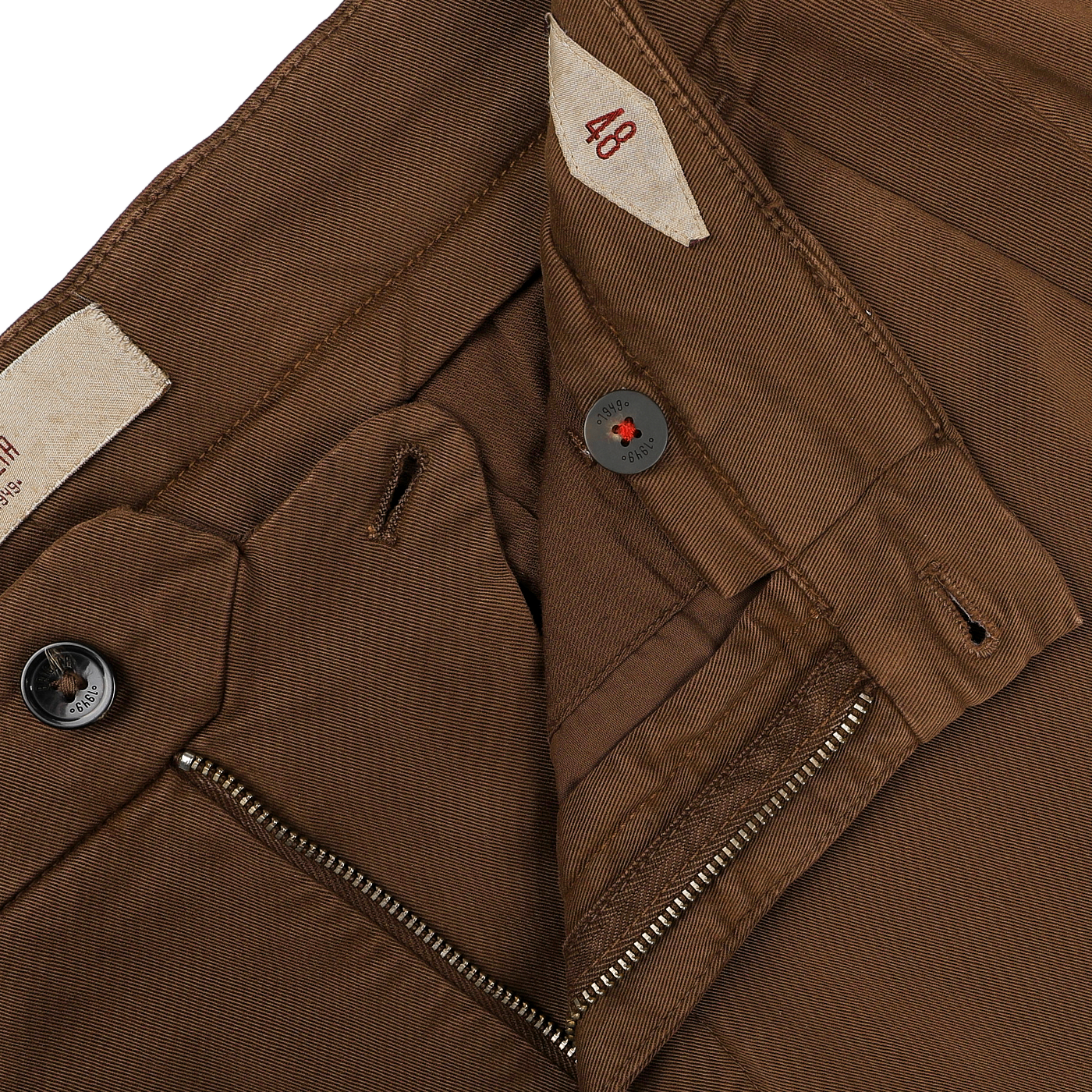 The Brown Cotton Stretch Soho Trousers by Briglia feature a visible button and partially open zipper fly, revealing an inside size tag labeled "48." Made from cotton twill, these trousers offer a regular fit that combines style with comfort.