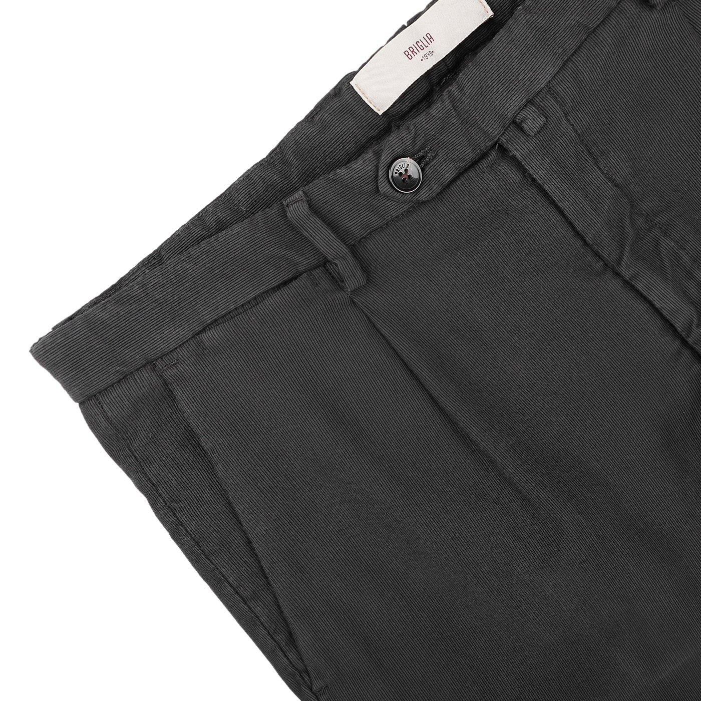 Close-up of Briglia's Dark Grey Cotton Twill BG21 Pleated Trousers, featuring a black button and belt loops, with vertical stitching adorning the waistband and a brand label inside. Crafted by an Italian trouser specialist, these pants are made from pure cotton twill for a refined touch.