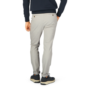 A person wearing Briglia's Light Grey Cotton Stretch BG62 Casual Chinos and a blue sweater.